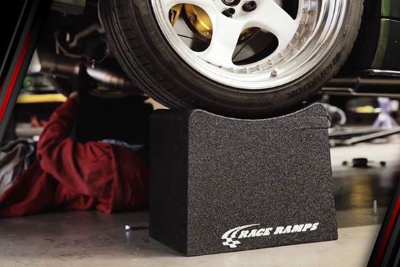 Card image cap for How to Get Your Vehicle up on Race Ramps Wheel Cribs